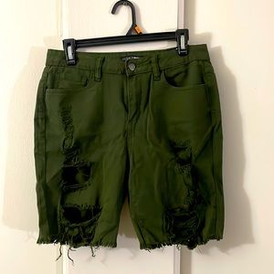 Forest green mid thigh cut out shorts